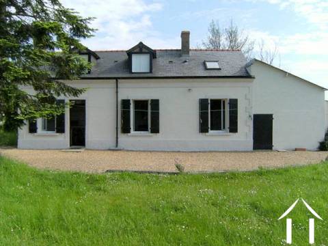 UNE JOLIE MAISON SUR UN TERRAIN EN CAMPAGNE DE 2000m2