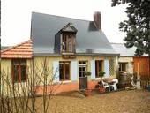 MAISON EN PARTIE RÉNOVÉE AVEC BEAUCOUP PLUS À DONNER