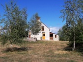 The gîte has a sejour (kitchen/living room), a shower room and WC, plus three bedrooms. There is a large vaulted cave underneath.