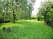 The garden is mainly laid to lawn and includes quite a large number of fruit trees.