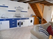 The kitchen is part of the gîte open plan sejour (35m2).