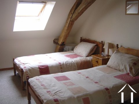 Typical styling of the bedrooms. All three of them are large double/twin rooms with good height.