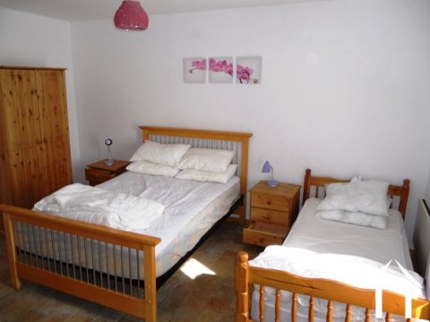 One of the double bedrooms - this one has an ensuite bathroom (bath / separate shower / washbasin / WC).