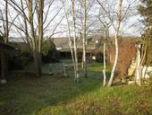 This picture is taken from the driveway and shows the veranda which runs the width of the house and provides an excellent shaded area for alfresco dining - it overlooks the secluded garden.