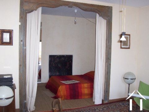 Alcove bedroom with sitting area