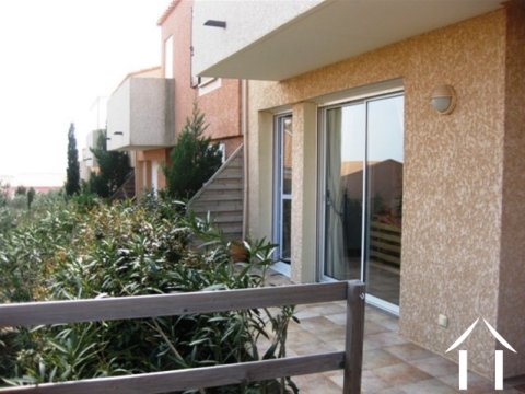 Appartement moderne au rez-de-chaussée, situé sur une zone d