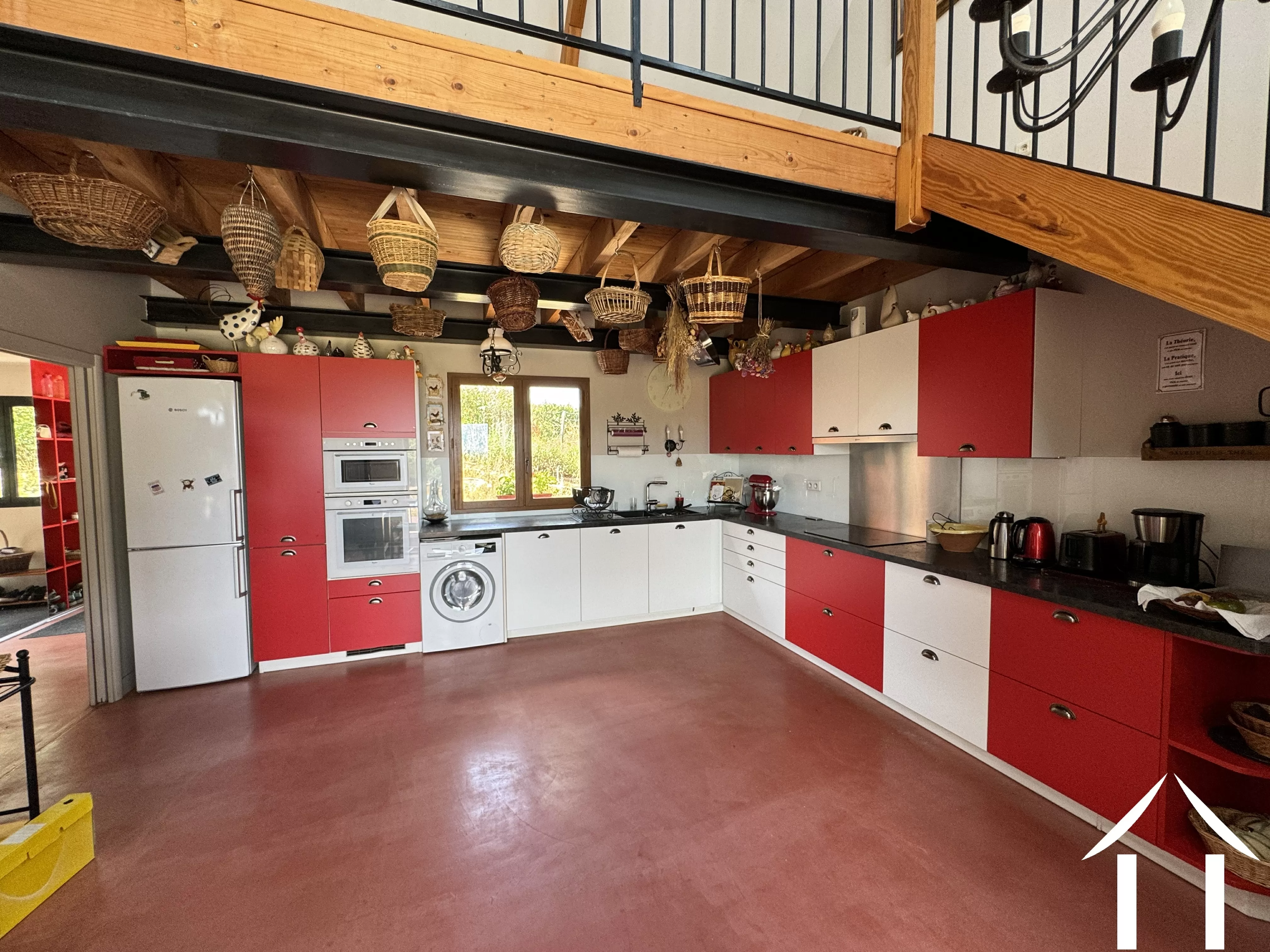 Open kitchen with stairs to 1st floor