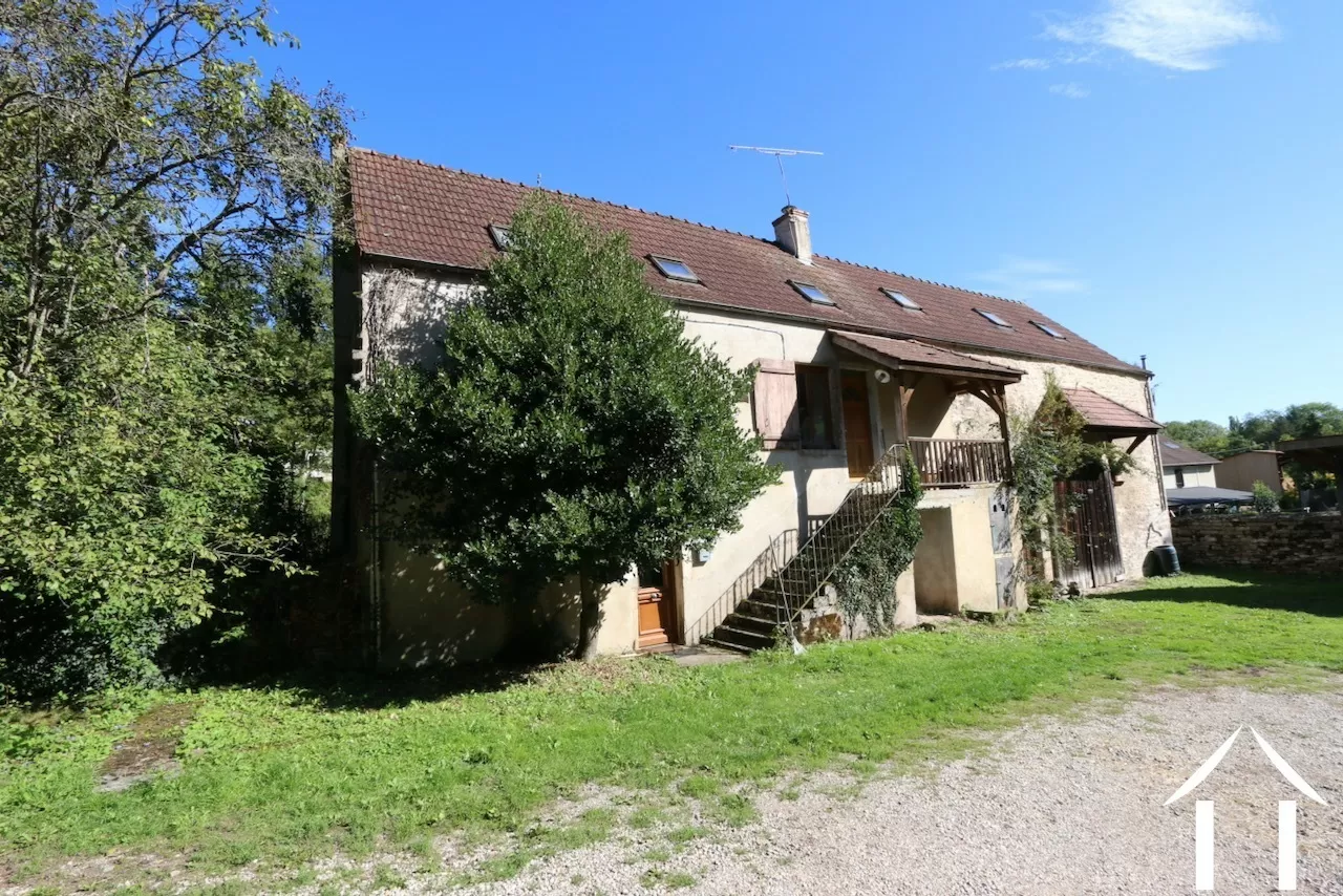 Maison en pierre avec des possibilités d'agrandissement