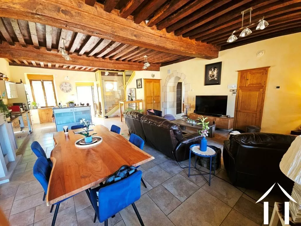 Living room to kitchen and staircase