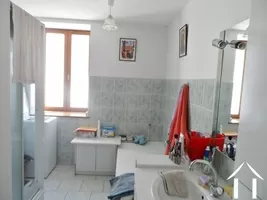 bathroom with bath, wash stand and shower