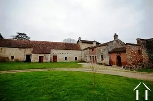 the courtyard with outbuildings