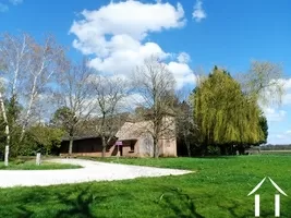 the farmhouse seen from the garden