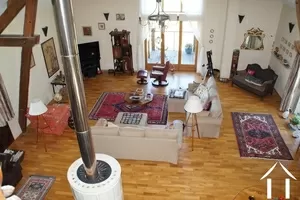 Living room equipped with large wood burner