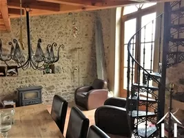 guest cottage with patio doors and wood burning heater