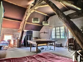 Bedroom with exposed beams