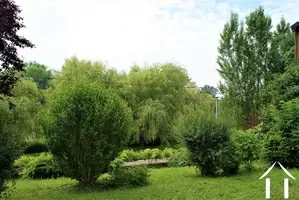 jardin à l'arrière / côté rivière