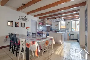 fully equipped kitchen, with dining area
