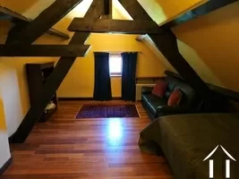 Chambre avec poutres apparentes