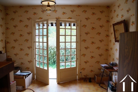porte dans la cuisine donnant sur le jardin