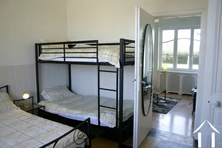 Chambre et salle de séjour du gîte