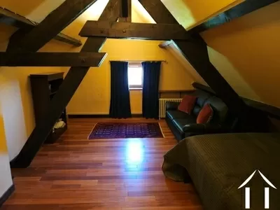 Chambre avec poutres apparentes