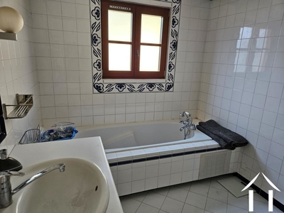 Bathroom with shower and wash basin