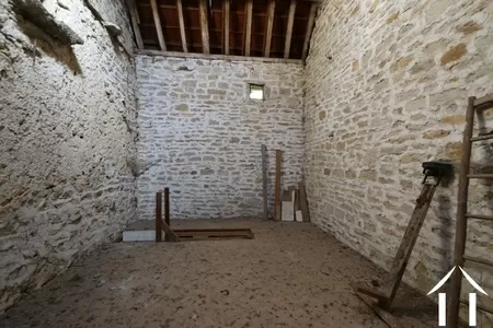 Chambre au-dessus du local de stockage