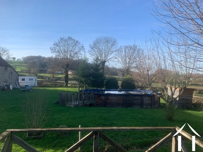 Vue arrière maison piscine hors sol