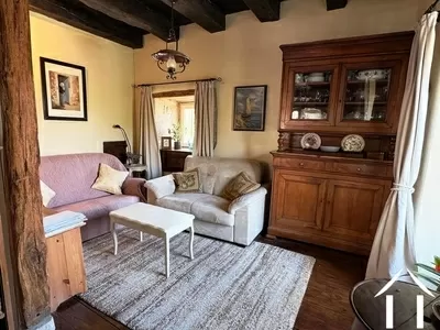 Salon cosy avec accès au jardin