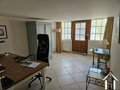 Chambre ou salle à manger au rez-de-chaussée